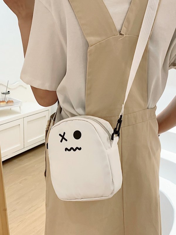 Bolso bandolera blanco con cara de dibujos animados-1